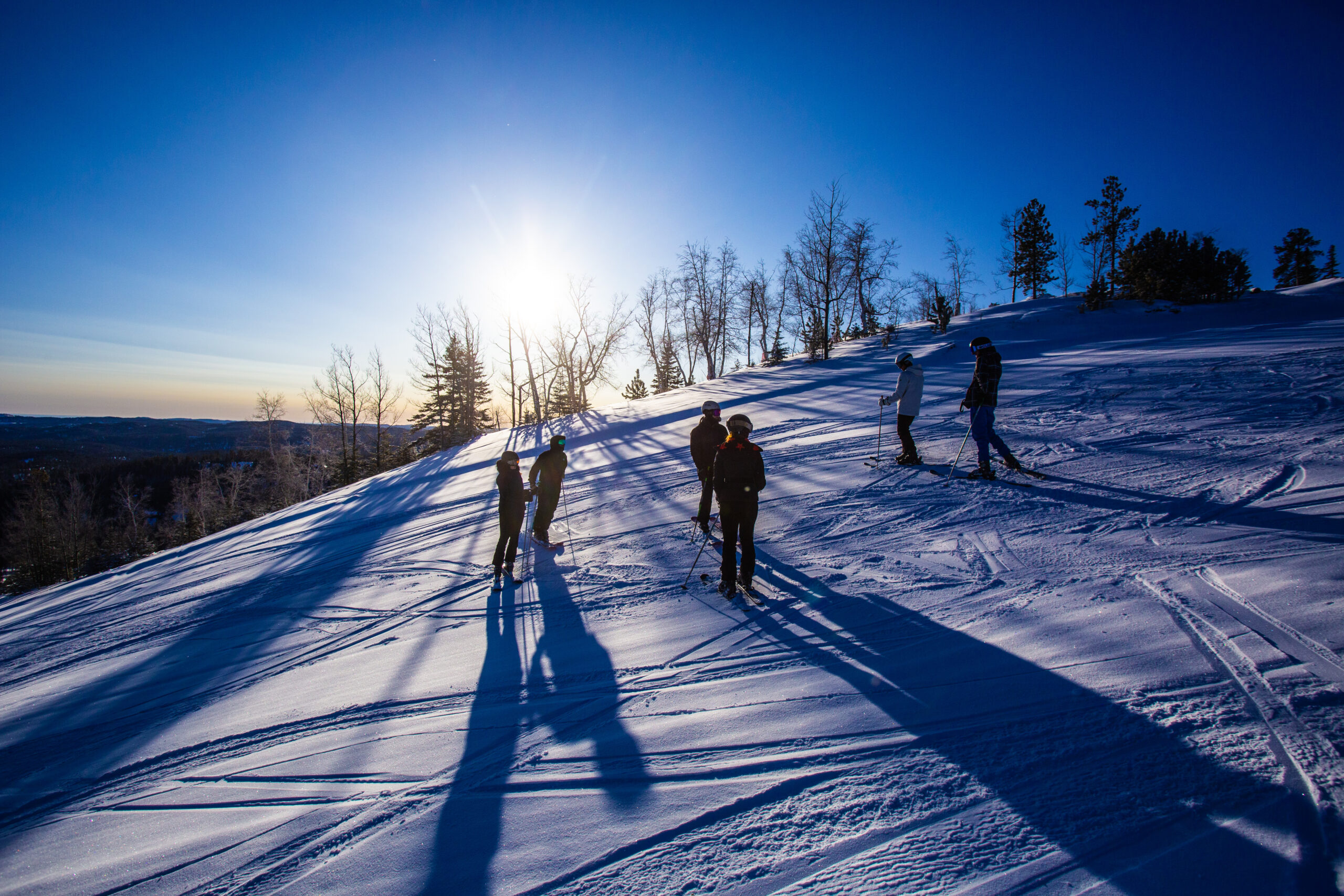Group skiing at Deer Mountain Village.